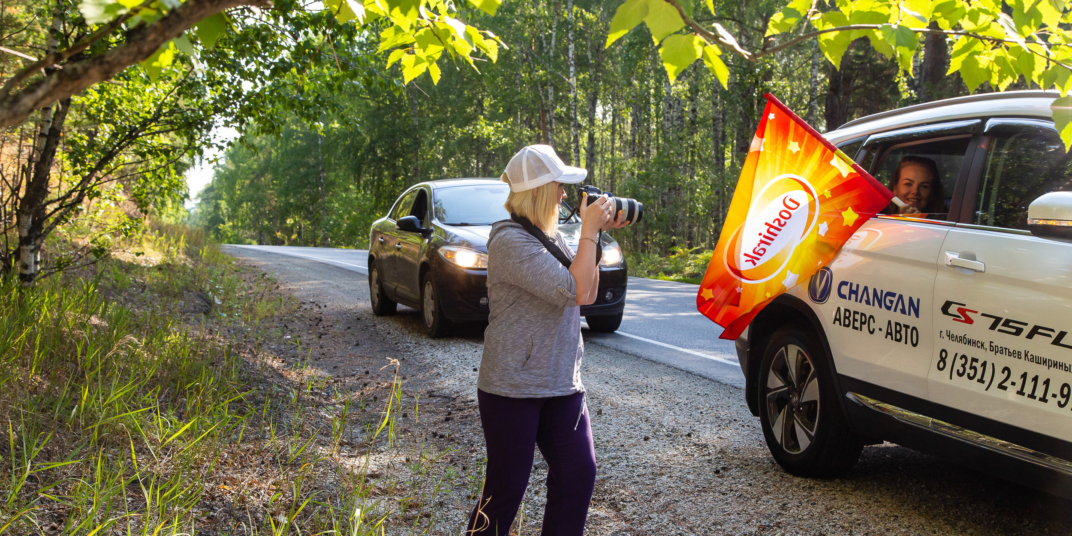 женщина с фотоаппаратом